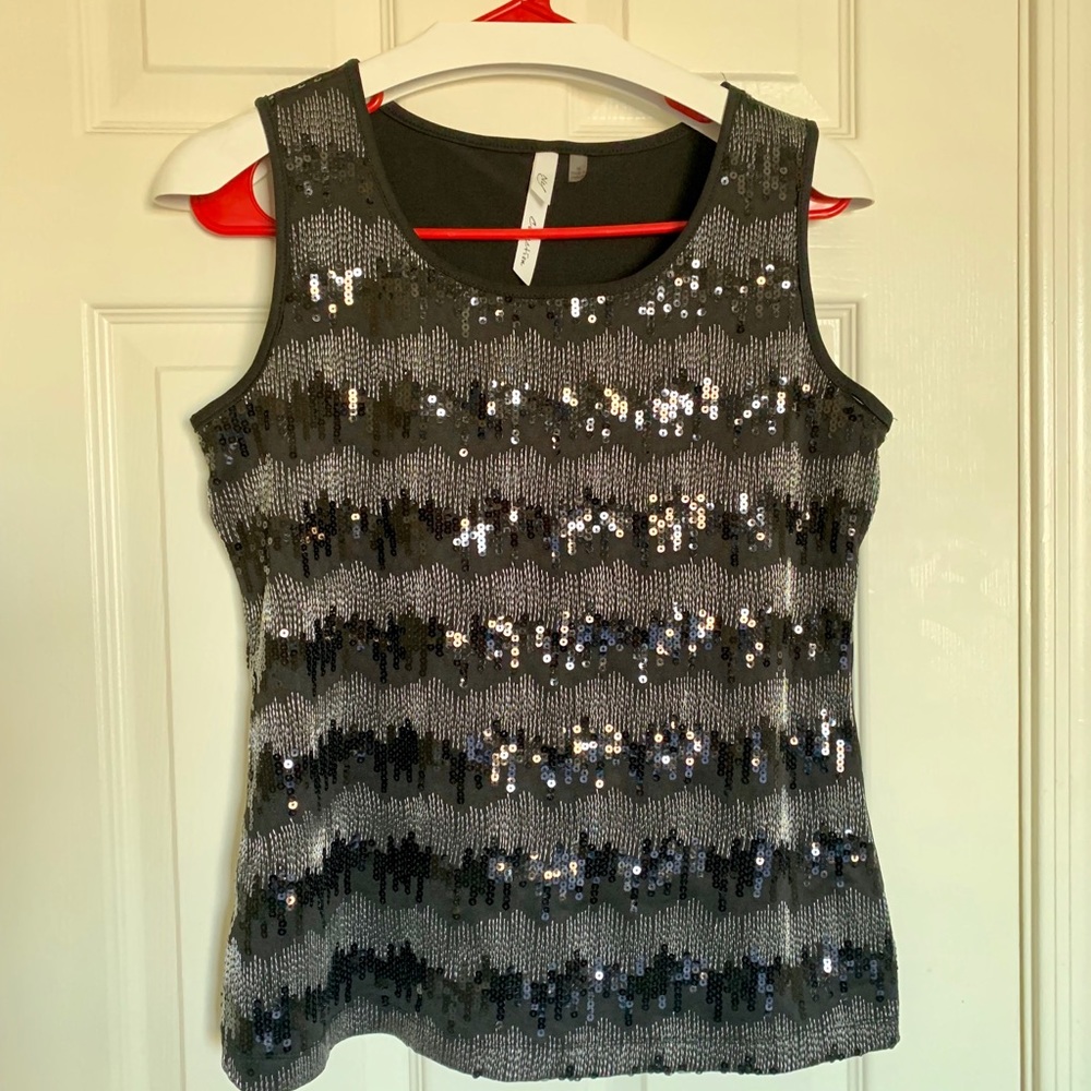 Black shiny medium size sleeveless top .